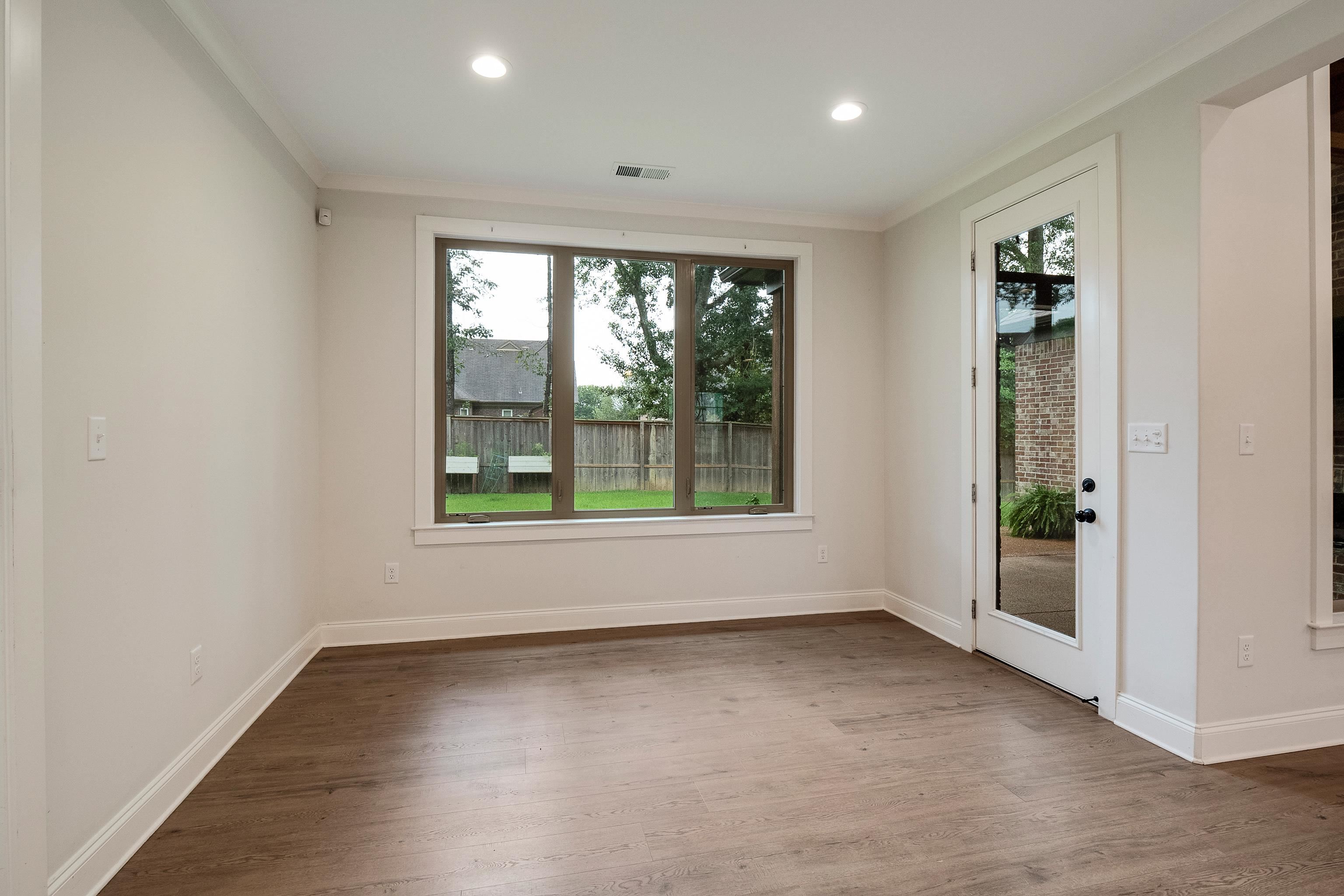 1365 Belfair Drive Collierville, TN 38017 - Photo 12 of 39 an empty room with windows