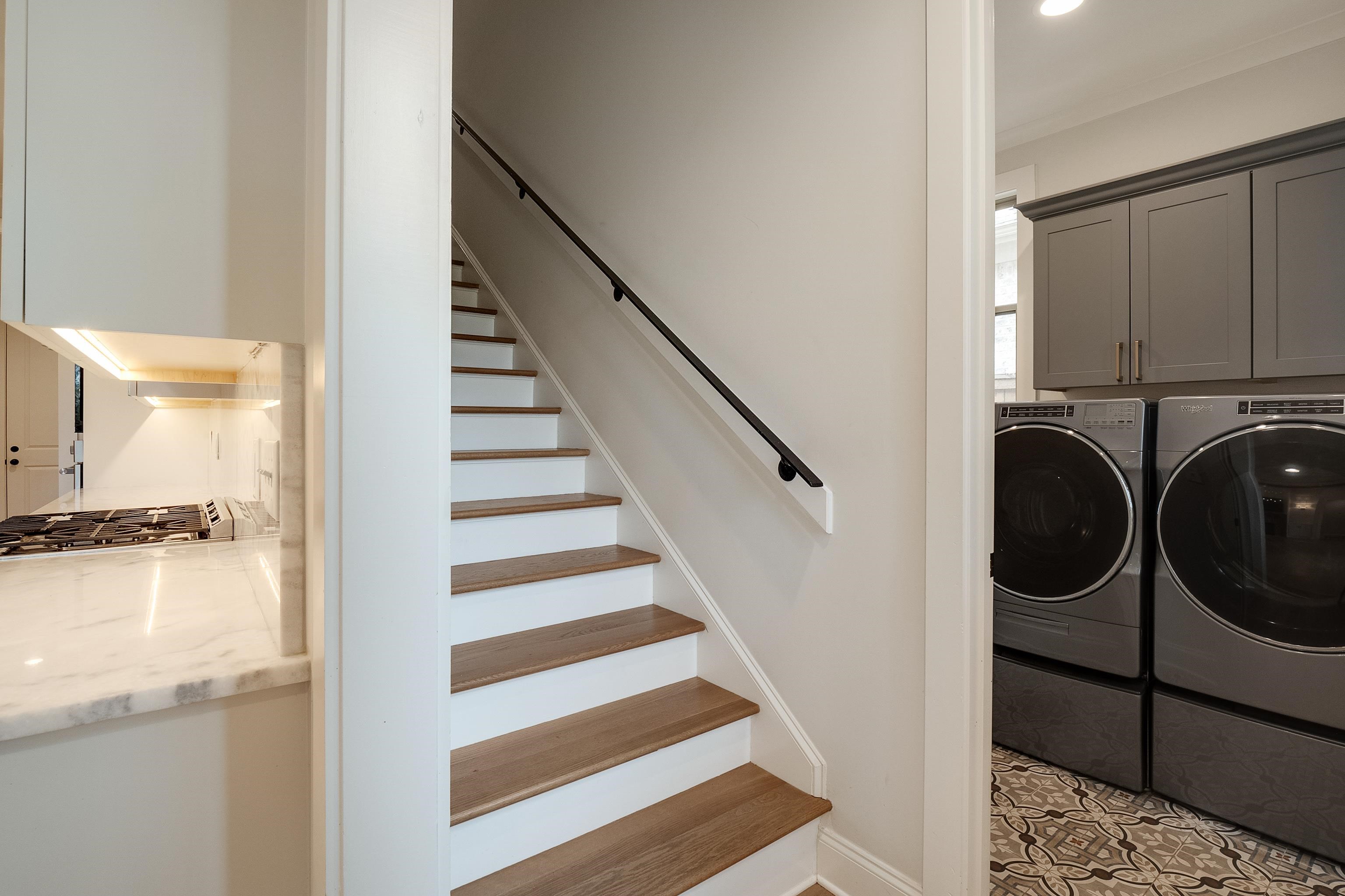 1365 Belfair Drive Collierville, TN 38017 - Photo 15 of 39 a view of a hallway with washer and dryer