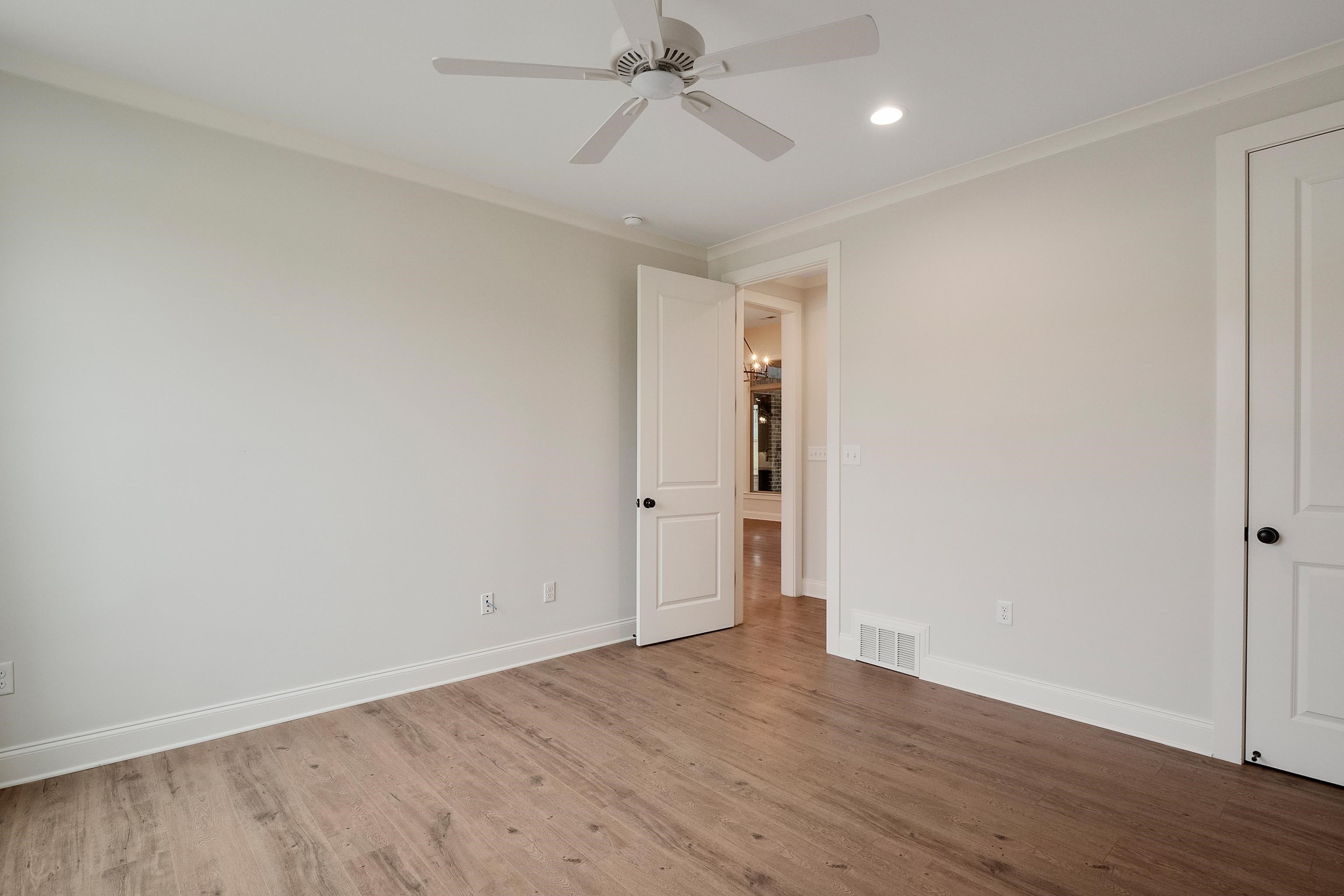 1365 Belfair Drive Collierville, TN 38017 - Photo 21 of 39 wooden floor in an empty room