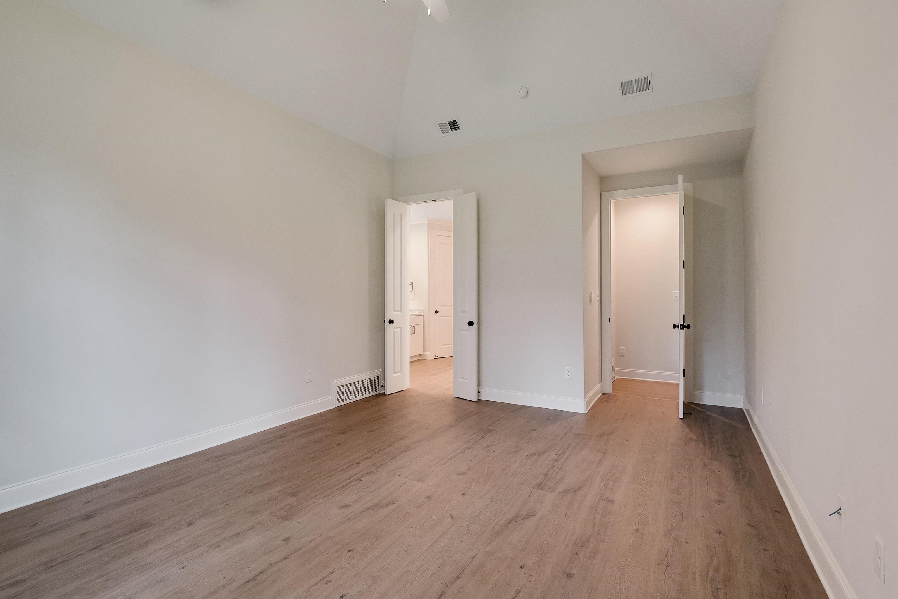 1365 Belfair Drive Collierville, TN 38017 - Photo 24 of 39 a view of an empty room and wooden floor