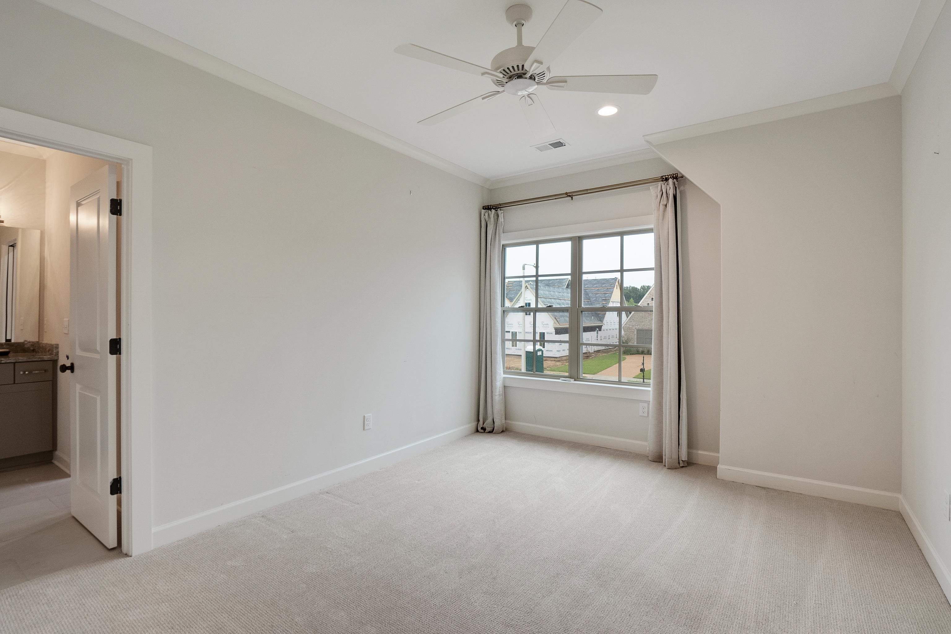 1365 Belfair Drive Collierville, TN 38017 - Photo 32 of 39 wooden floor in an empty room with a window