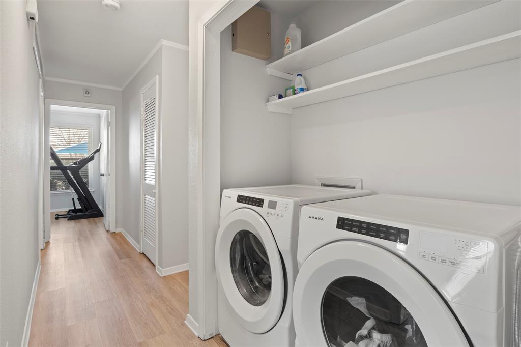 3518 Windsor Street Irving, TX 75062 - Photo 13 of 21 a view of a hallway with washer and dryer