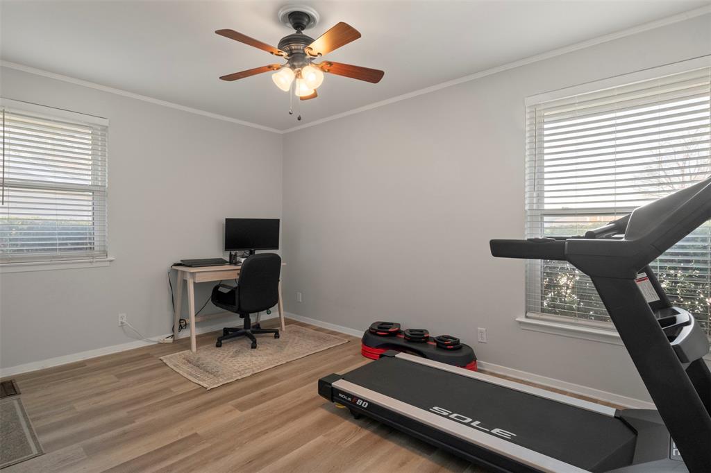 3518 Windsor Street Irving, TX 75062 - Photo 17 of 21 a room with furniture and a window
