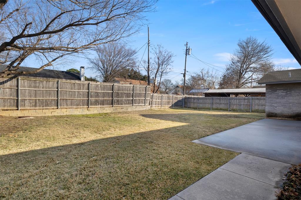 3518 Windsor Street Irving, TX 75062 - Photo 21 of 21 a view of a swimming pool with a yard
