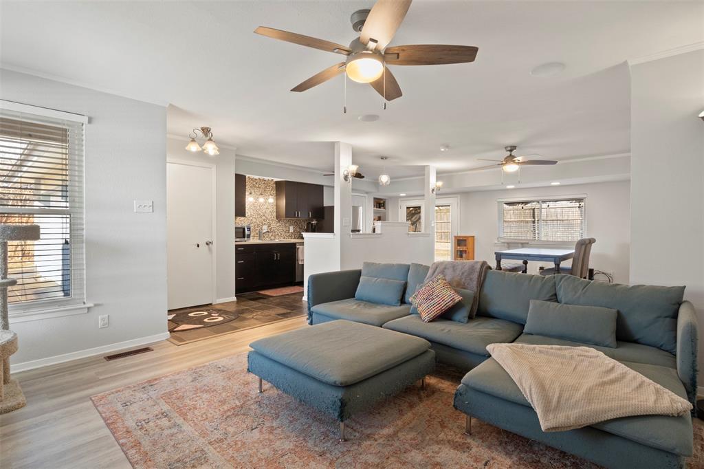 3518 Windsor Street Irving, TX 75062 - Photo 6 of 21 a living room with furniture and a large window