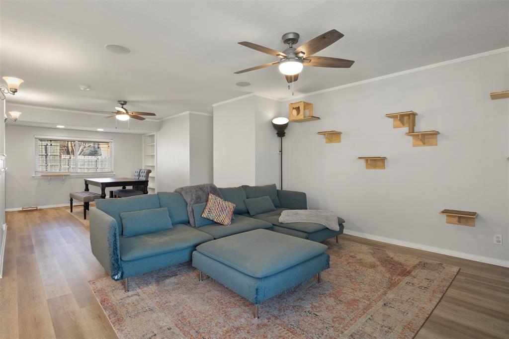 3518 Windsor Street Irving, TX 75062 - Photo 7 of 21 a living room with furniture and a wooden floor