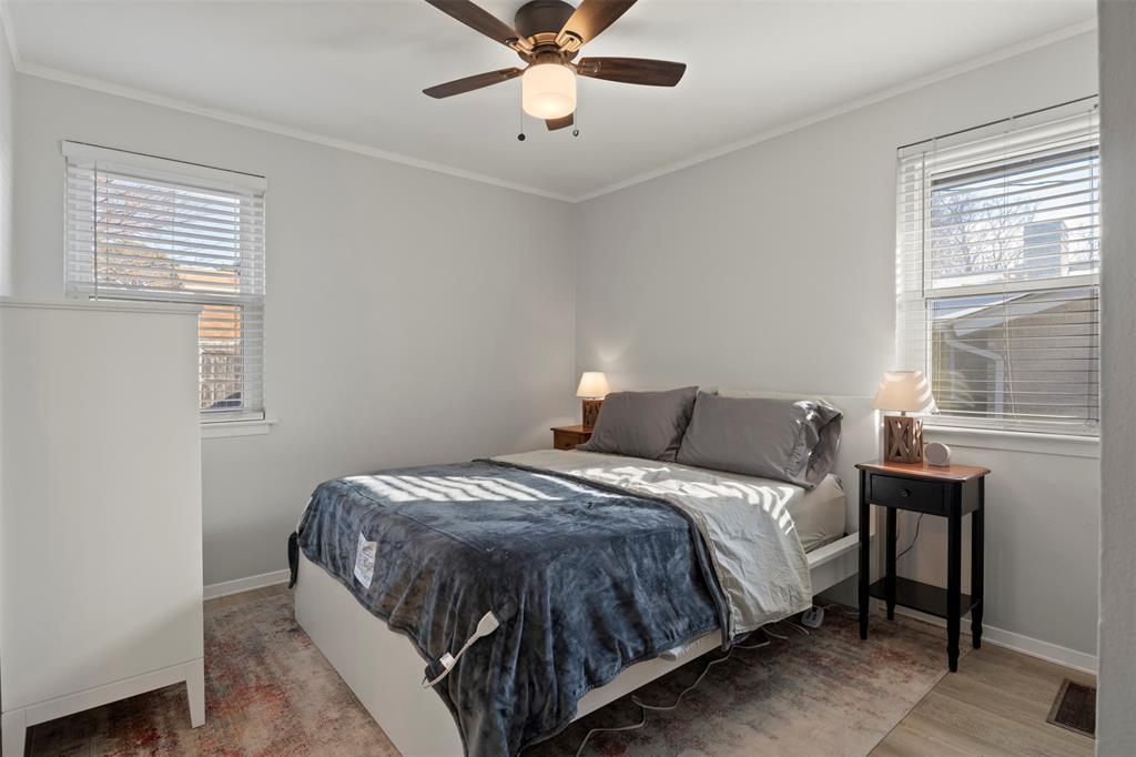 3518 Windsor Street Irving, TX 75062 - Photo 10 of 21 a bedroom with a bed and window