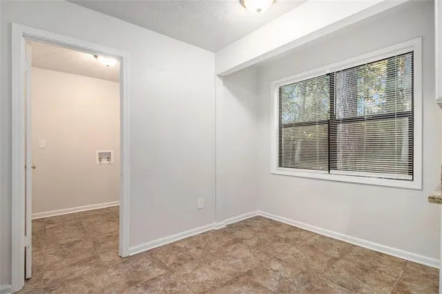 an empty room with a window