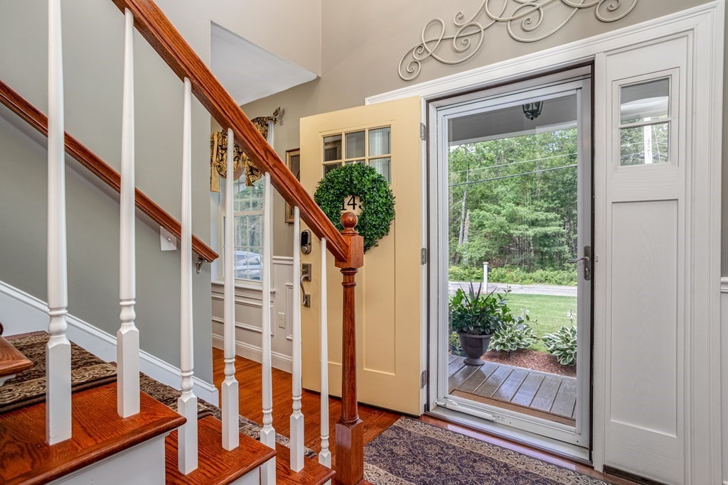 145 Tuckerman Road Ashburnham, MA 01430 - Photo 5 of 42 a view of an entryway with wooden floor and windows