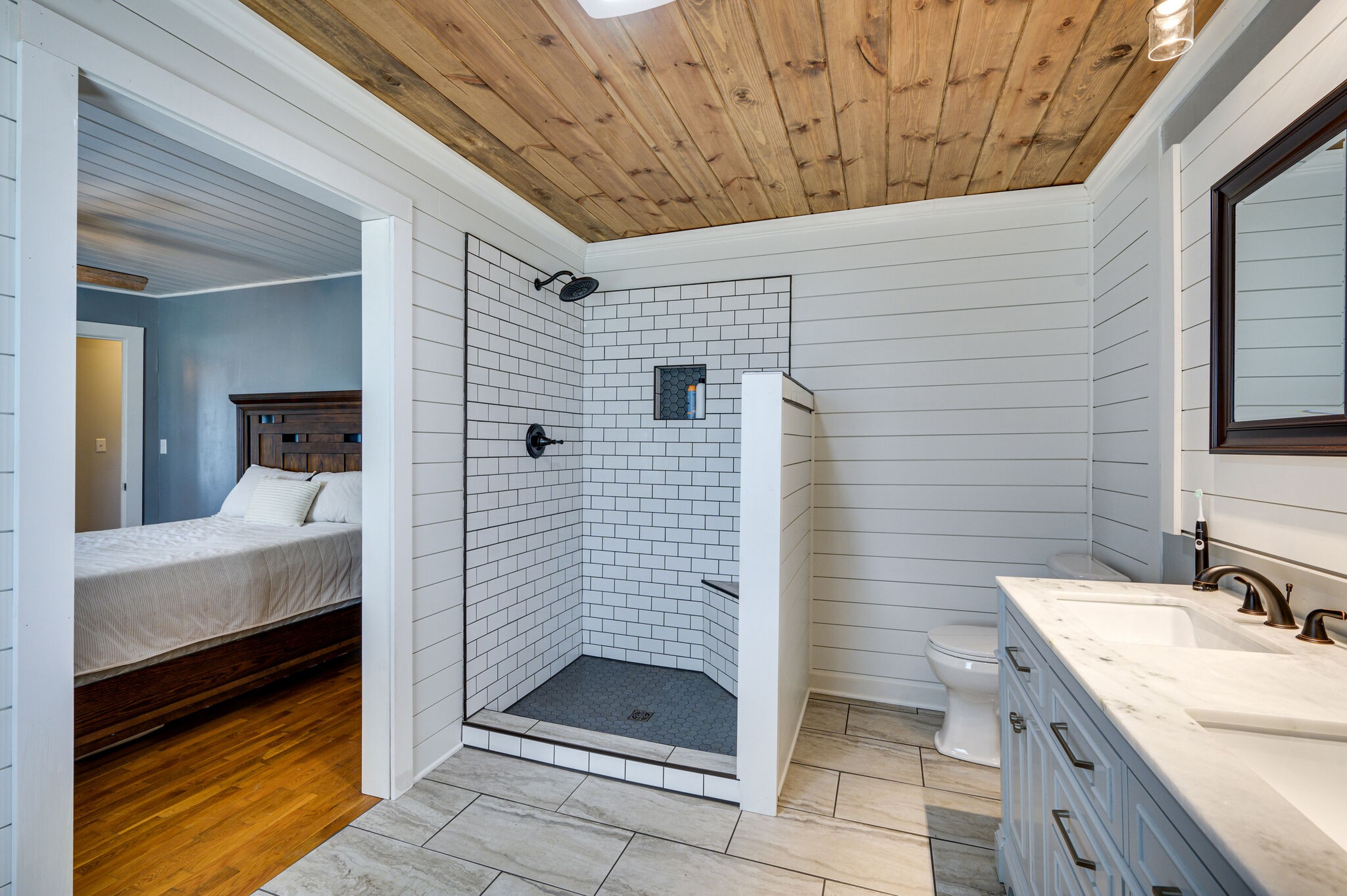 2558 Chisholm Road Iron City, TN 38463 - Photo 17 of 35 a bathroom with a sink and a shower