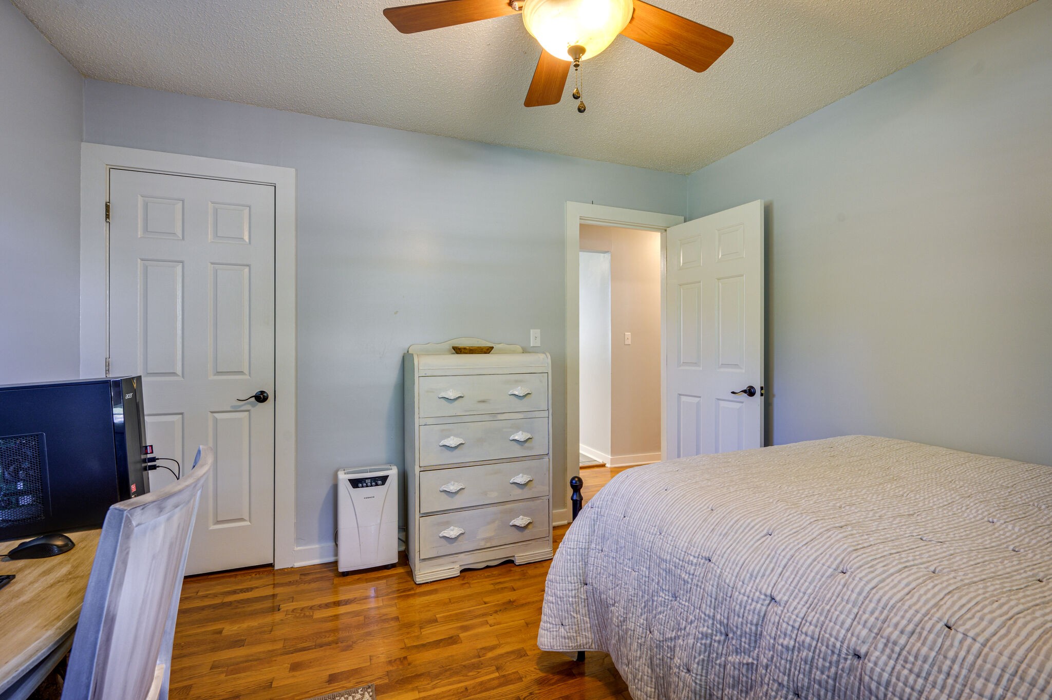 2558 Chisholm Road Iron City, TN 38463 - Photo 20 of 35 a bedroom with a bed and furniture