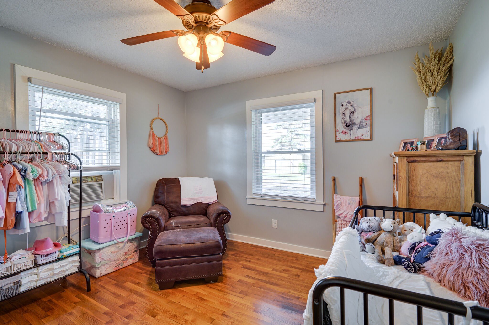 2558 Chisholm Road Iron City, TN 38463 - Photo 22 of 35 a bedroom with furniture and wooden floor