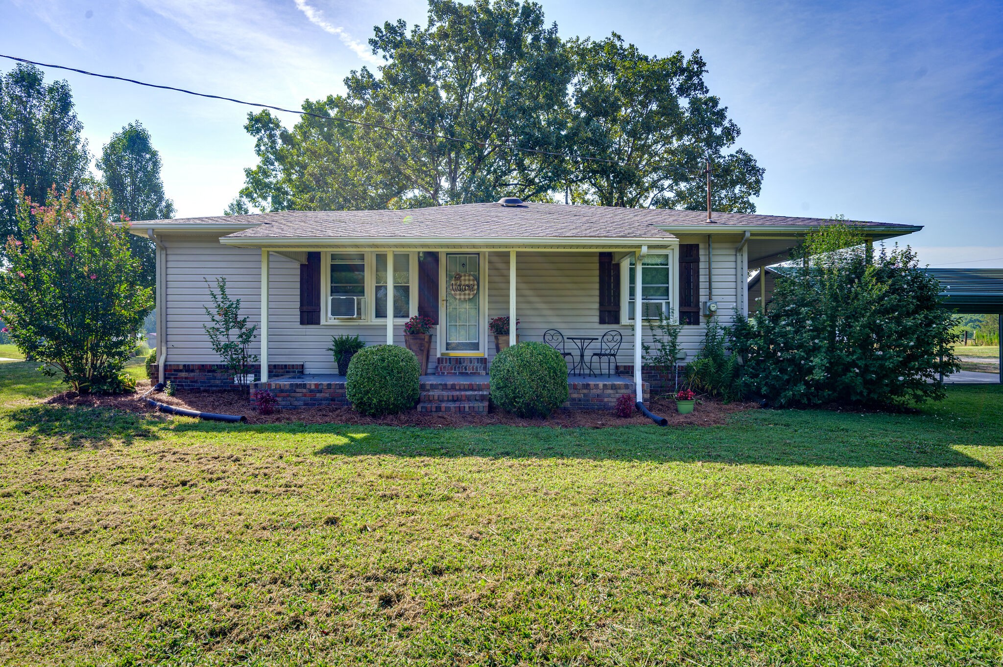 2558 Chisholm Road Iron City, TN 38463 - Photo 25 of 35 a view of a house with a yard porch and sitting area