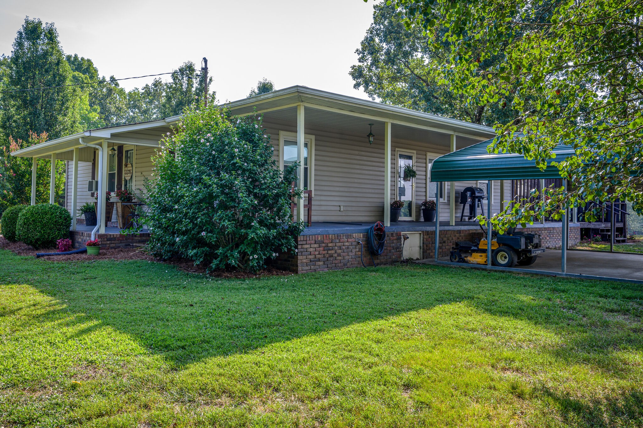 2558 Chisholm Road Iron City, TN 38463 - Photo 26 of 35 a front view of a house with garden