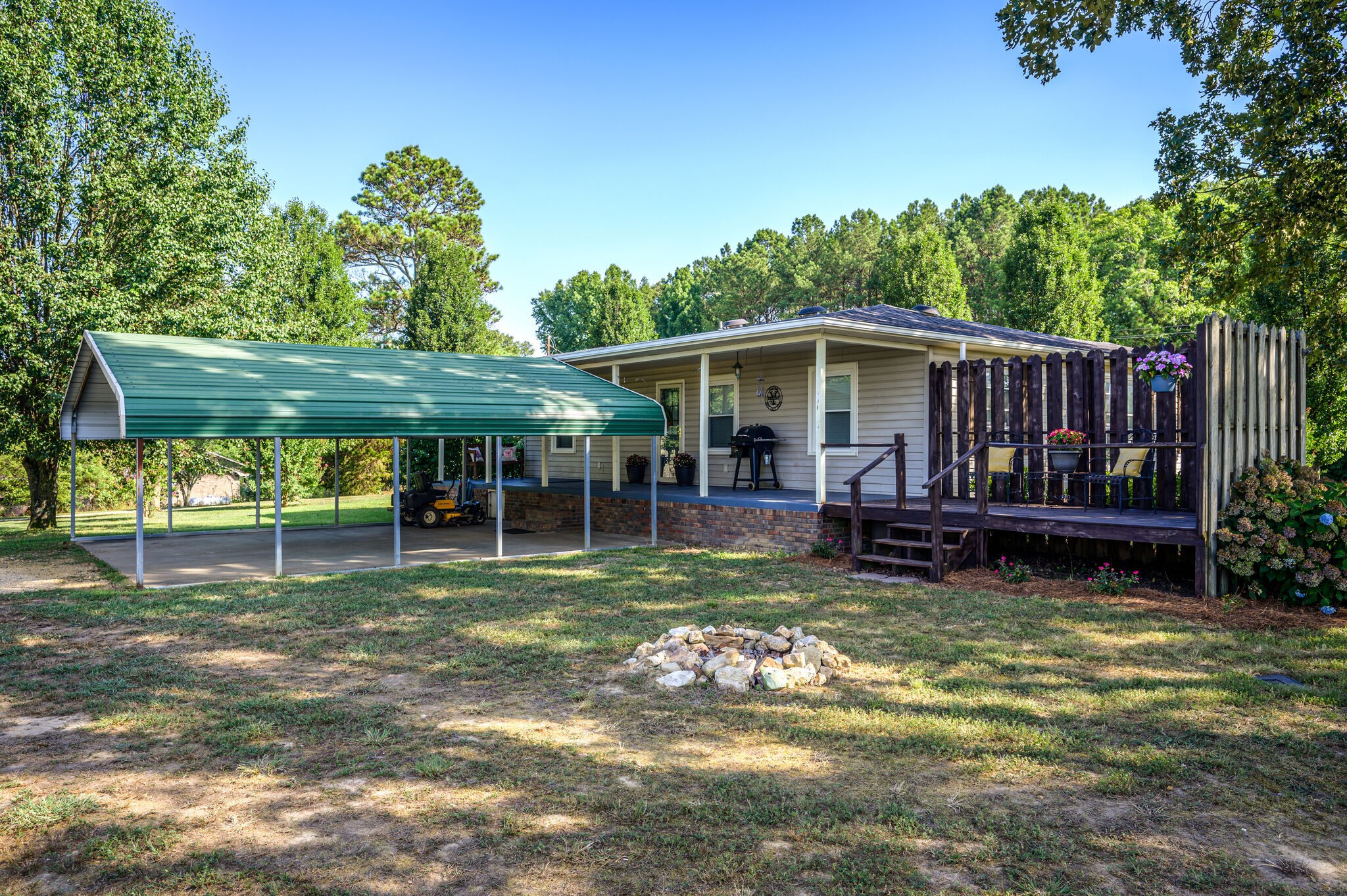 2558 Chisholm Road Iron City, TN 38463 - Photo 28 of 35 a view of a chair and table in backyard of the house