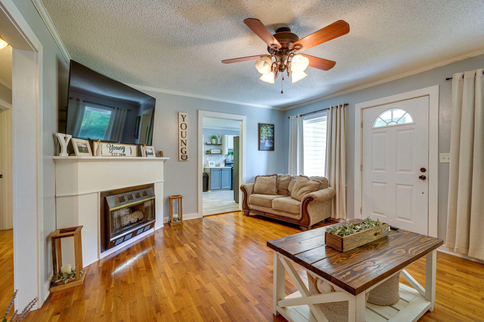 2558 Chisholm Road Iron City, TN 38463 - Photo 6 of 35 a living room with furniture and a fireplace