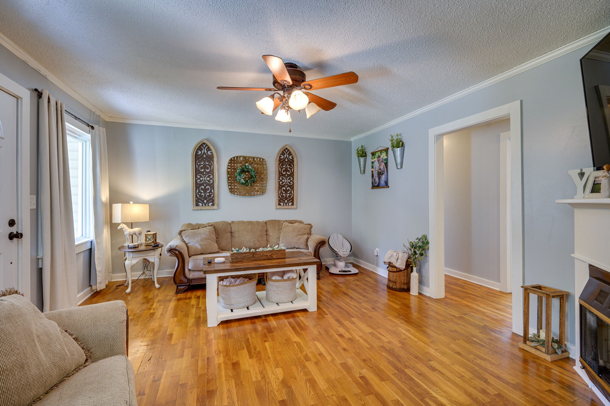 2558 Chisholm Road Iron City, TN 38463 - Photo 7 of 35 a living room with furniture and a wooden floor