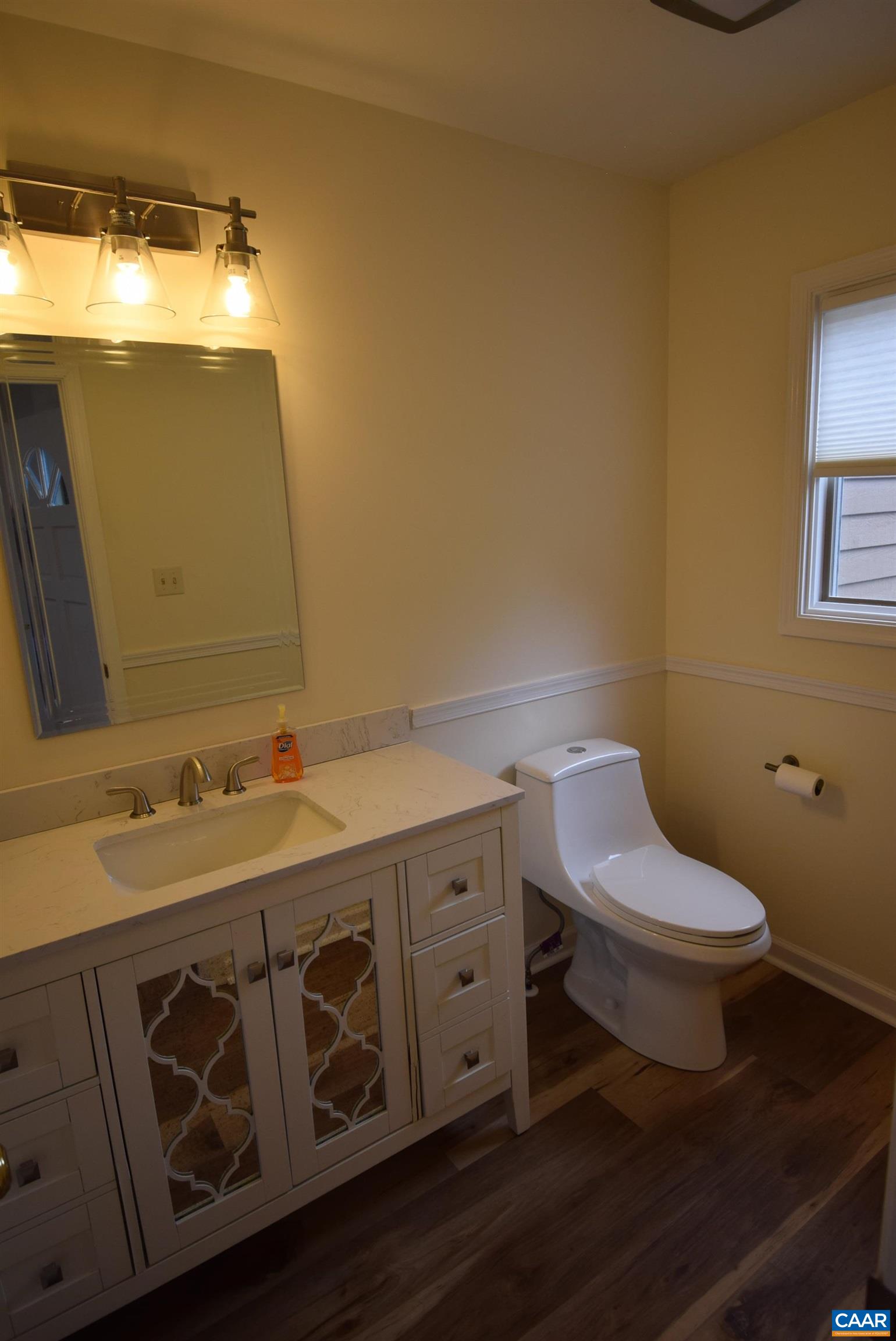 B3 Marina Point Palmyra, VA 22963 - Photo 17 of 31 a bathroom with a sink and a toilet