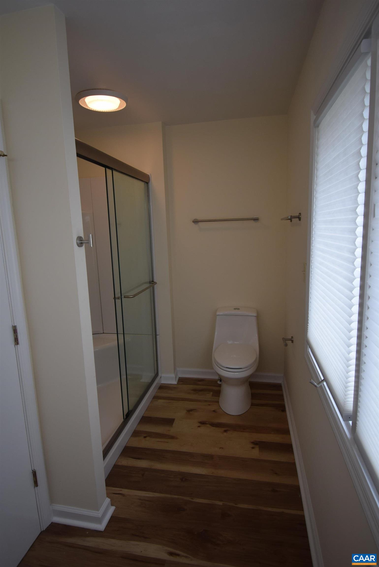 B3 Marina Point Palmyra, VA 22963 - Photo 19 of 31 a bathroom with a sink and toilet