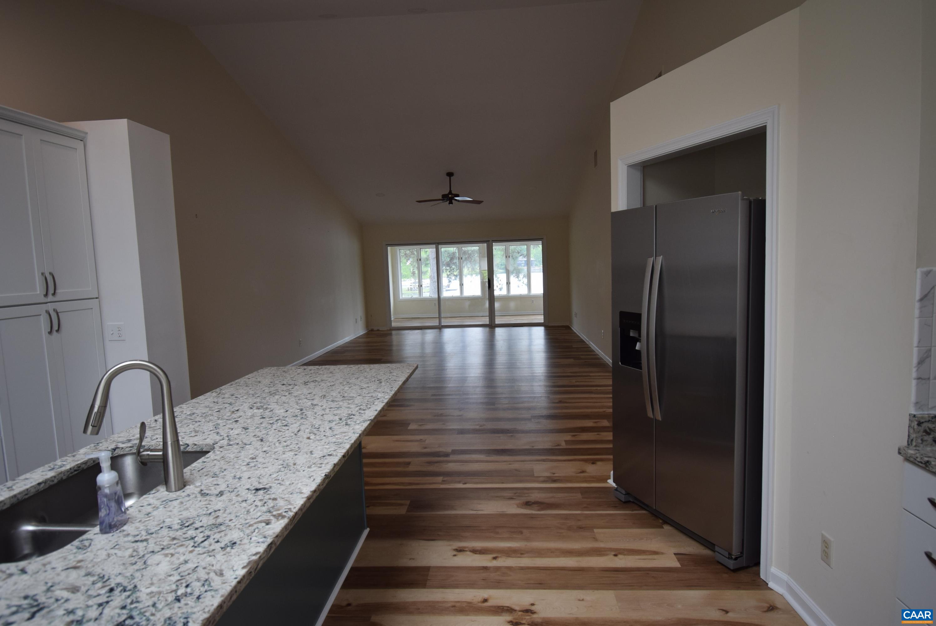 B3 Marina Point Palmyra, VA 22963 - Photo 8 of 31 a view of entryway and hall with wooden floor