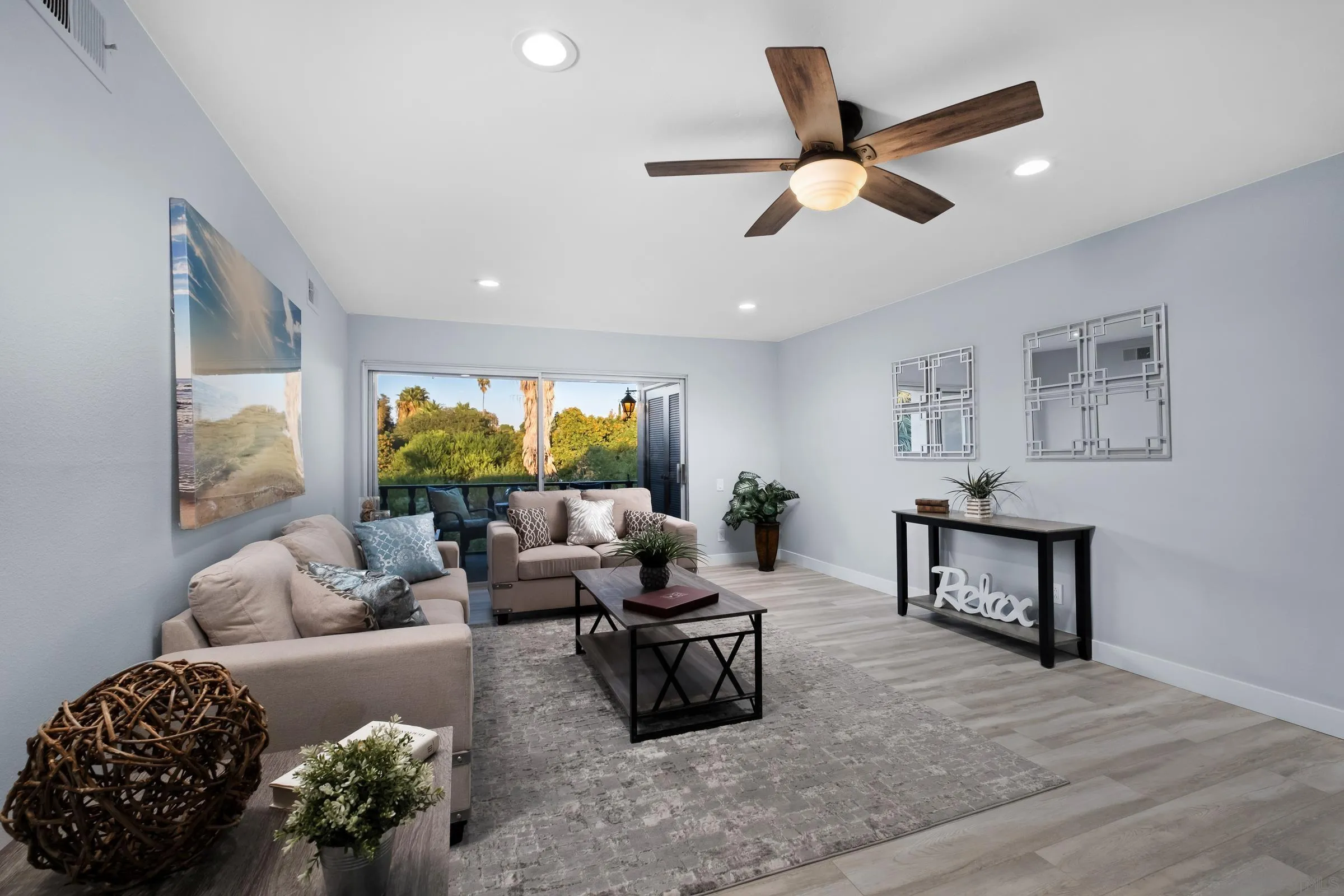 12176 Rancho Bernardo Road, Unit B San Diego, CA 92128 - Photo 1 of 41 a living room with furniture and a large window
