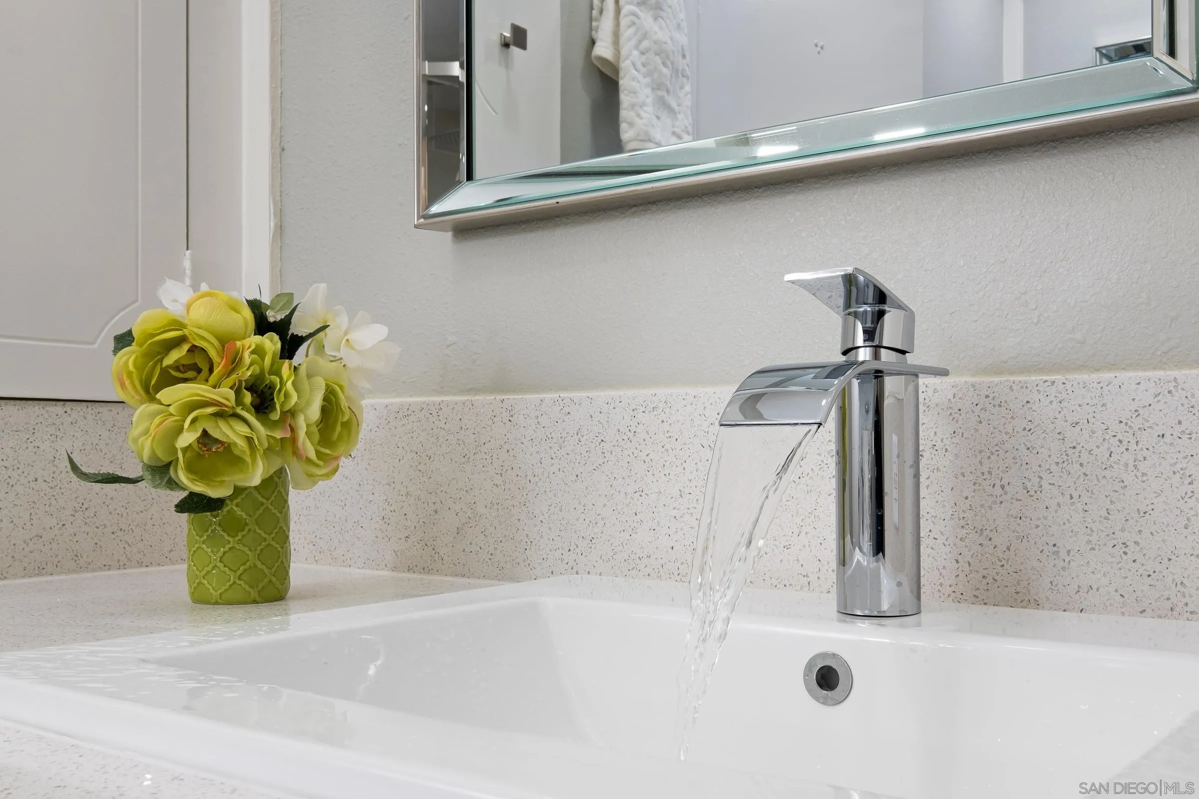 12176 Rancho Bernardo Road, Unit B San Diego, CA 92128 - Photo 21 of 41 a bathroom with a sink