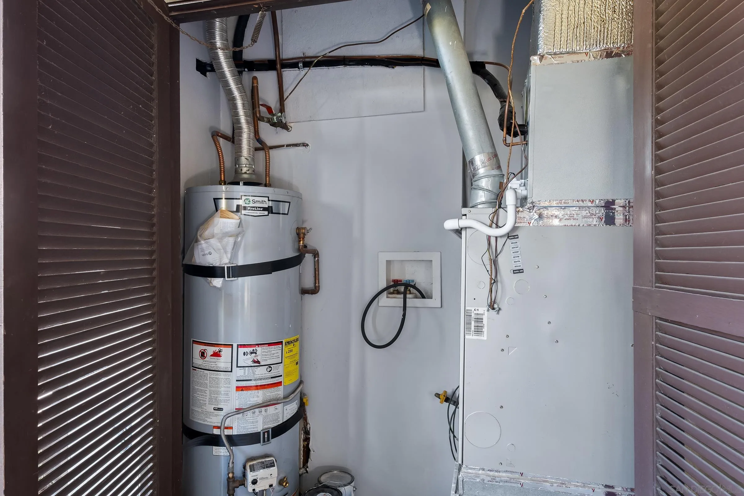 12176 Rancho Bernardo Road, Unit B San Diego, CA 92128 - Photo 25 of 41 a utility room with dryer and washer