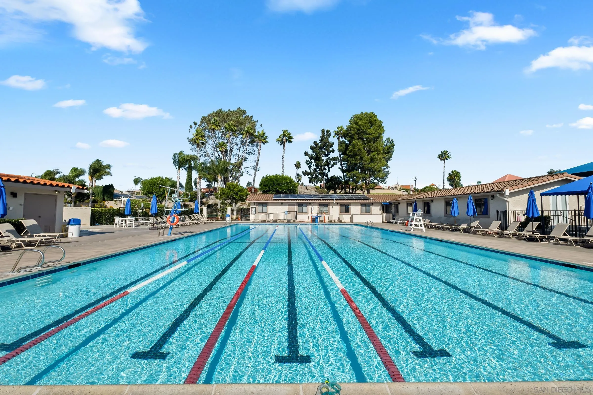 12176 Rancho Bernardo Road, Unit B San Diego, CA 92128 - Photo 33 of 41 a swimming pool with outdoor space and sitting space