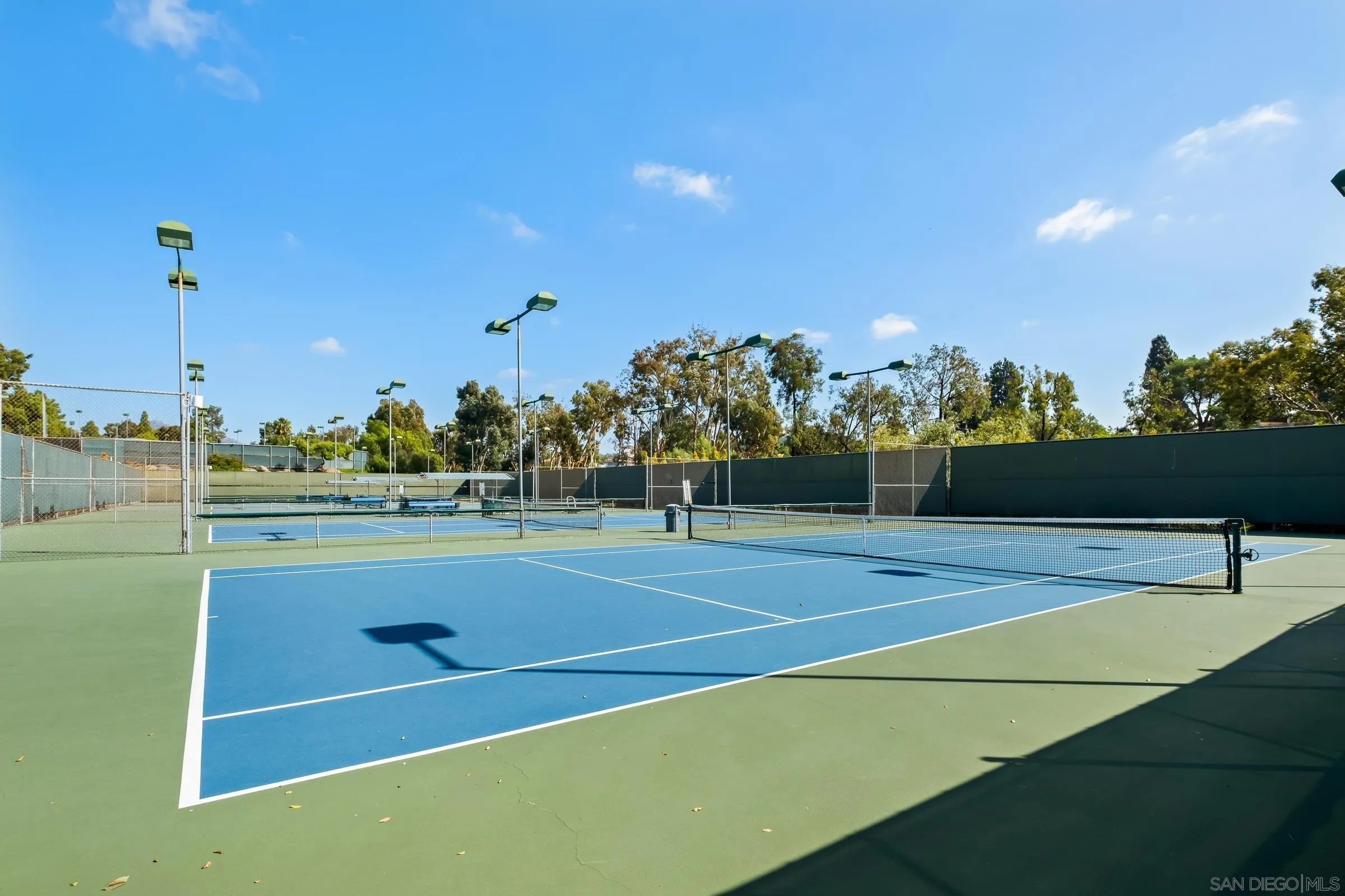 12176 Rancho Bernardo Road, Unit B San Diego, CA 92128 - Photo 34 of 41 a view of a tennis court