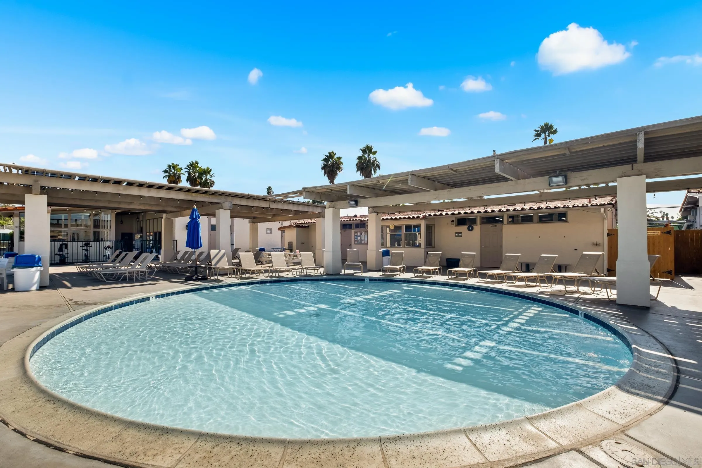 12176 Rancho Bernardo Road, Unit B San Diego, CA 92128 - Photo 38 of 41 a view of a house with swimming pool and sitting area