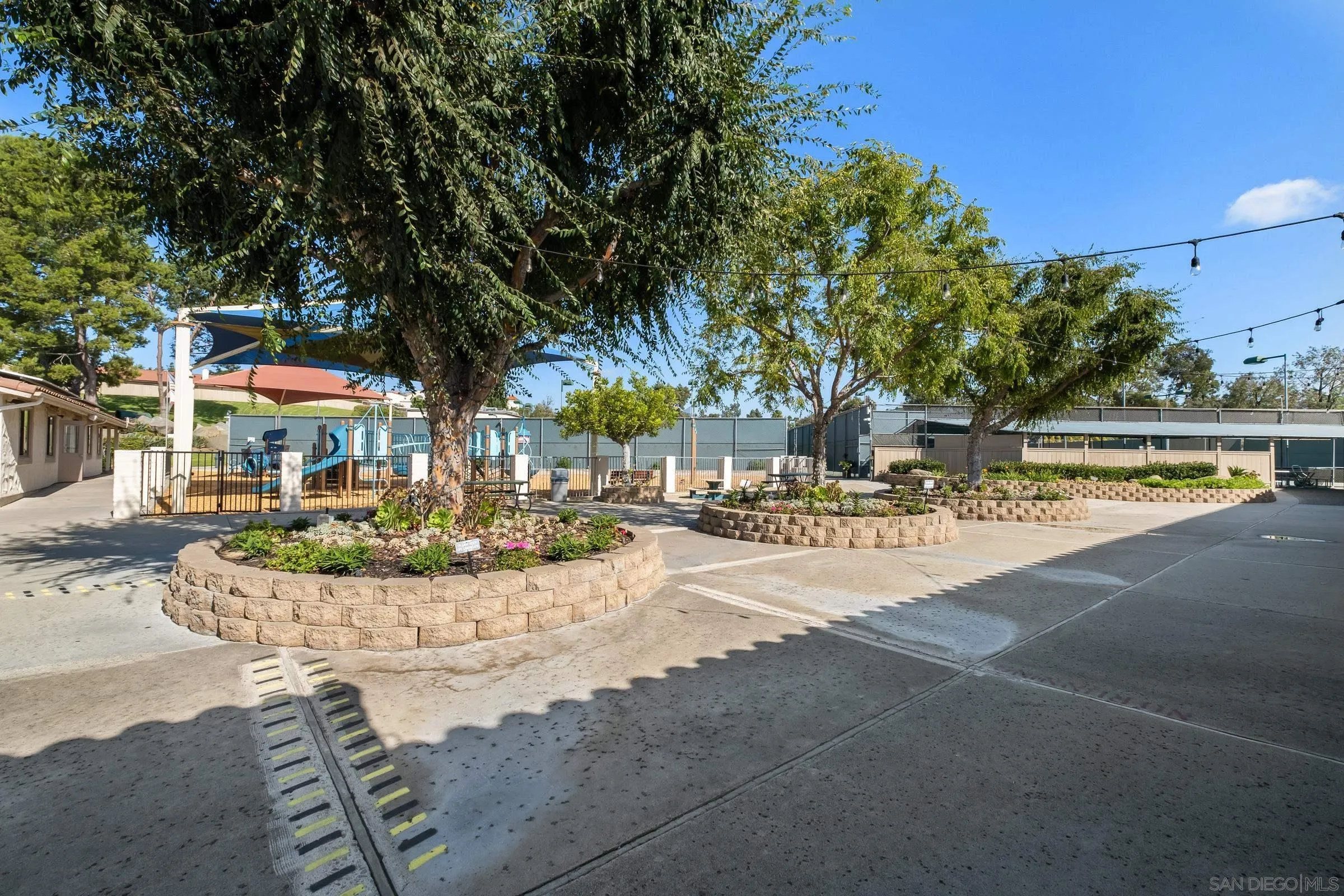 12176 Rancho Bernardo Road, Unit B San Diego, CA 92128 - Photo 41 of 41 a view of a water fountain in front of a house