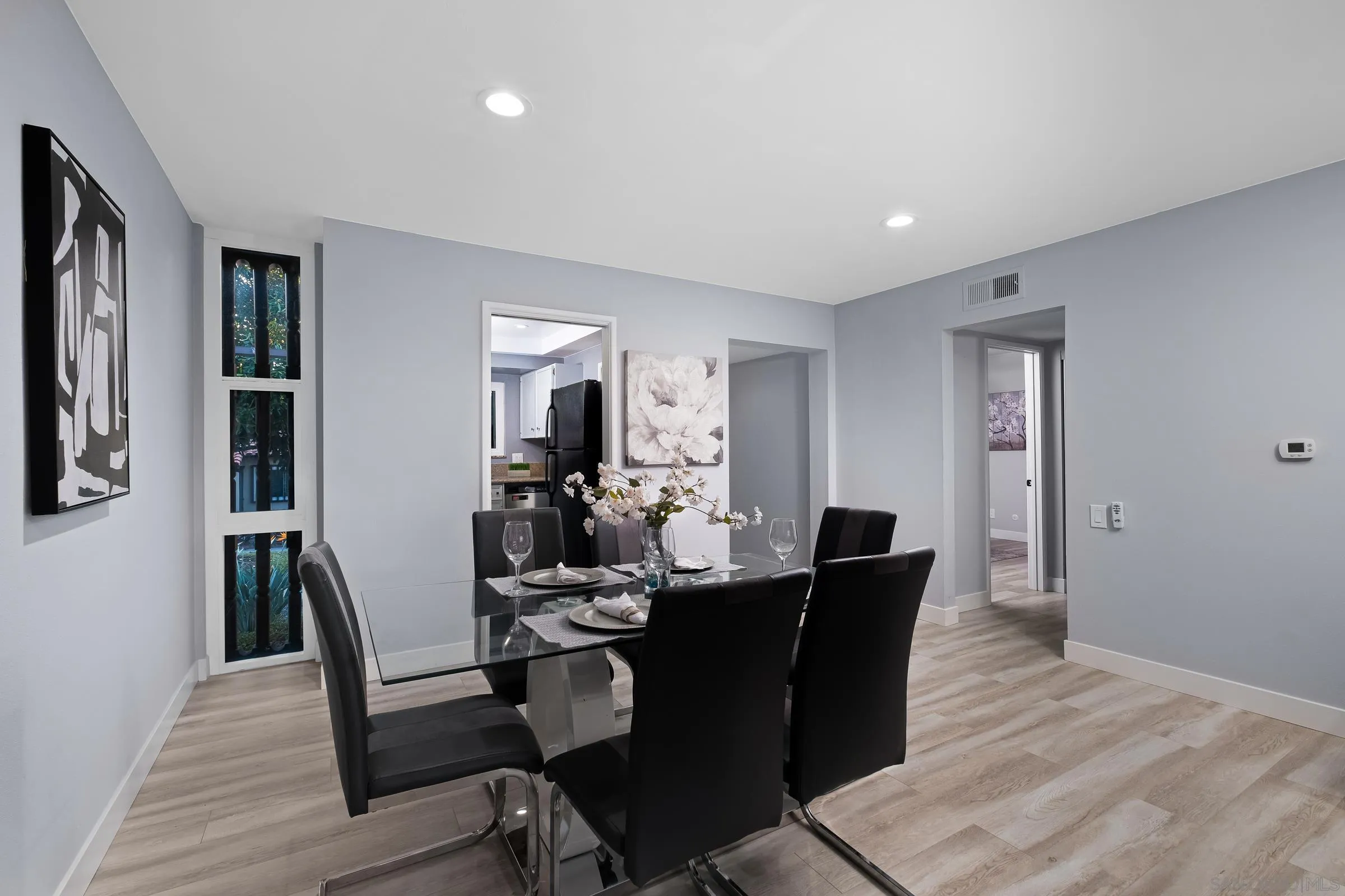 12176 Rancho Bernardo Road, Unit B San Diego, CA 92128 - Photo 8 of 41 a view of a dining room with furniture