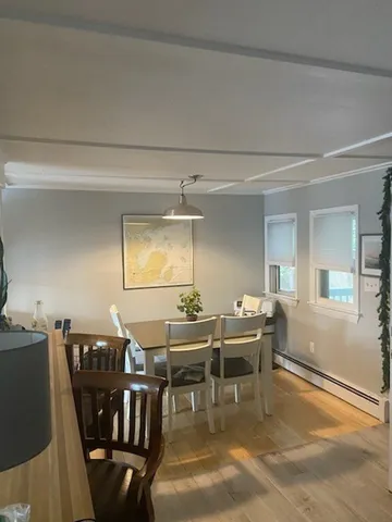 a view of a dining room with furniture