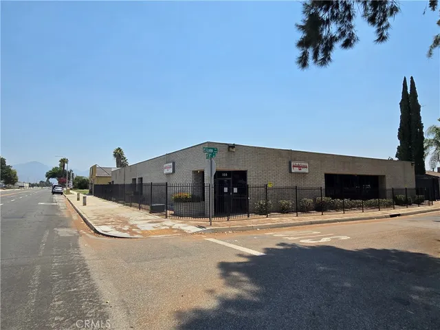 a view of the house with snow on the road