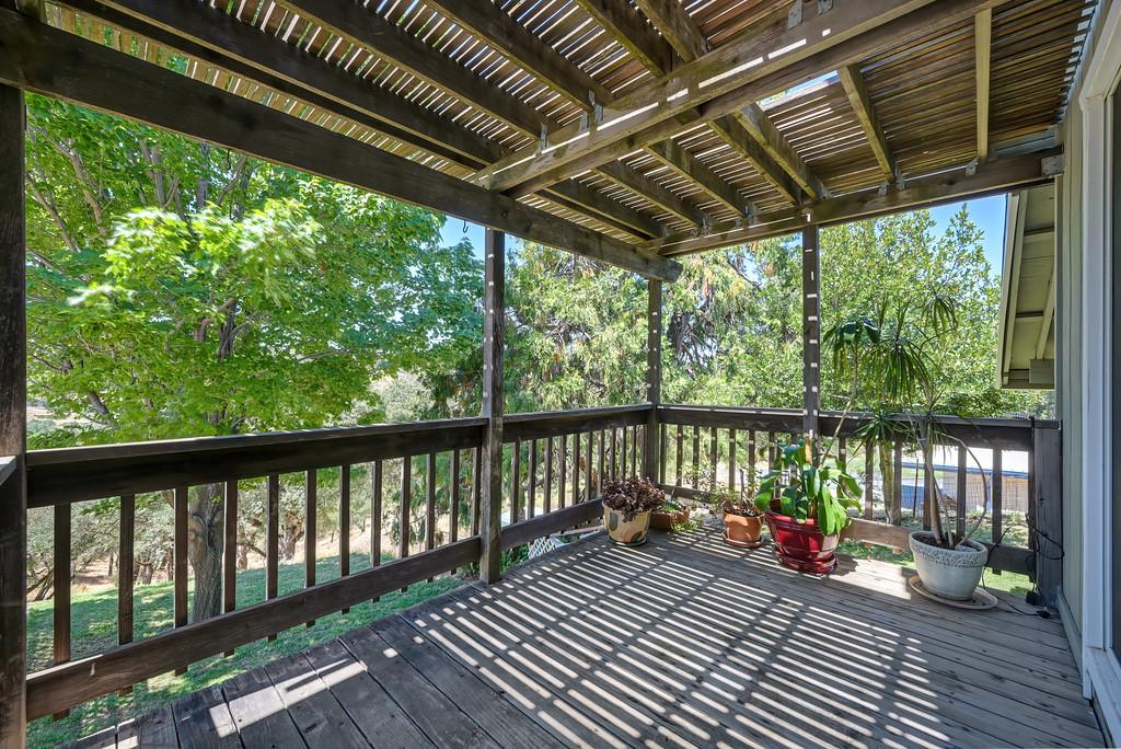 7630 Ridge Road Newcastle, CA 95658 - Photo 72 of 85 Expansive - walk-out, wrap-around covered patio for cozy shaded entertaining.