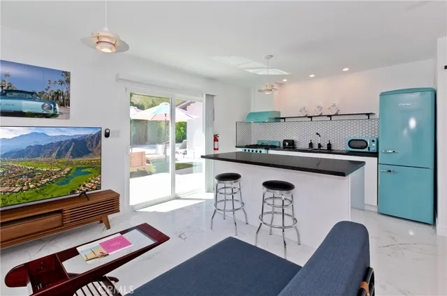 a swimming pool with some trees in the background