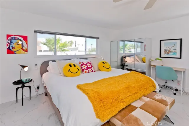 a metallic refrigerator freezer sitting in a kitchen