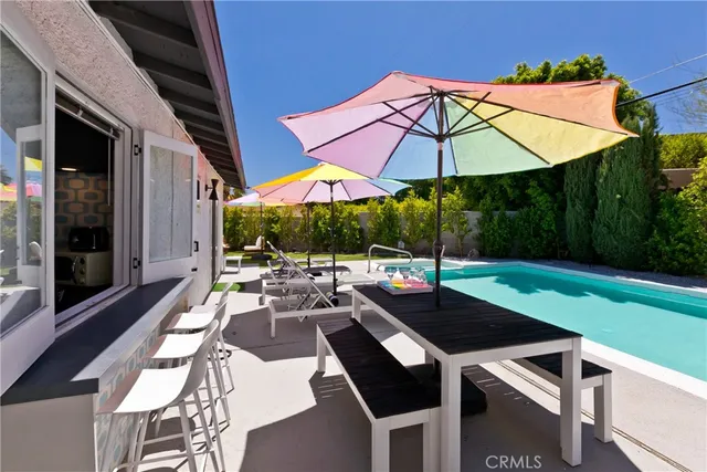 a view of a terrace with furniture