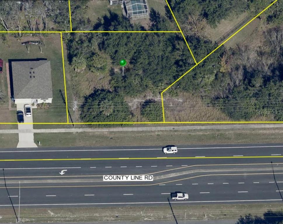 6041 County Line Road Spring Hill, FL 34606 - Photo 5 of 7 a view of entryway and hall