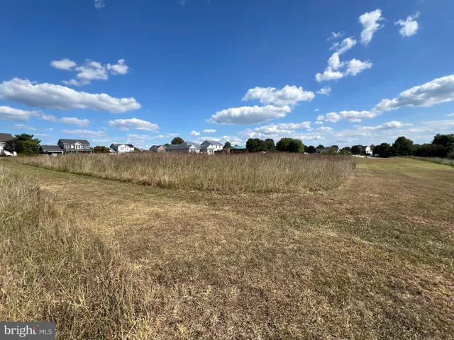 a view of an ocean and sunset