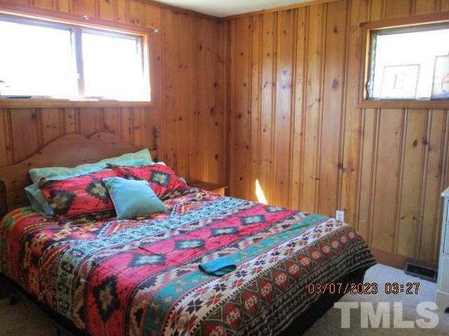3416 Rolesville Road Wendell, NC 27591 - Photo 9 of 18 a bedroom with a bed and a window