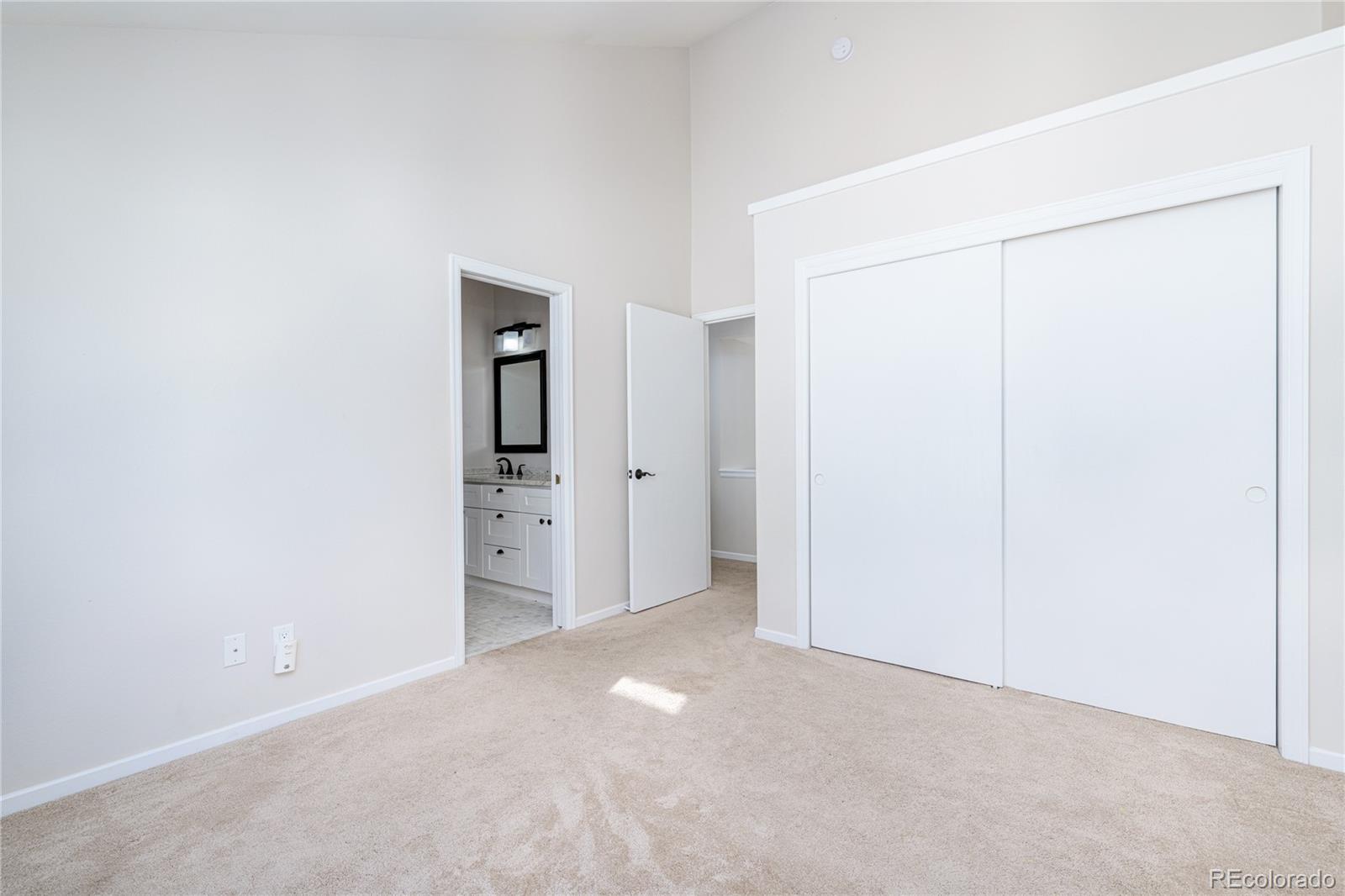 541 Monroe Street, Unit A Denver, CO 80206 - Photo 21 of 45 a view of a room with an empty space