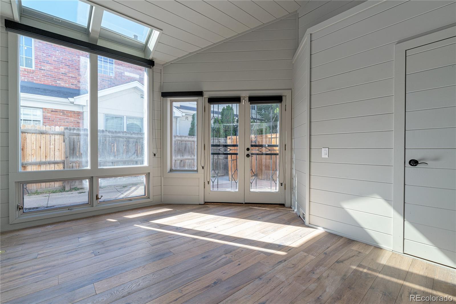 541 Monroe Street, Unit A Denver, CO 80206 - Photo 3 of 45 a view of outdoor space with wooden floor and windows