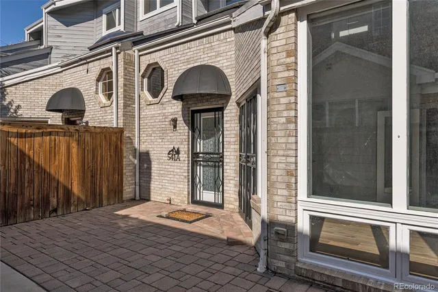 a front view of a house with yard