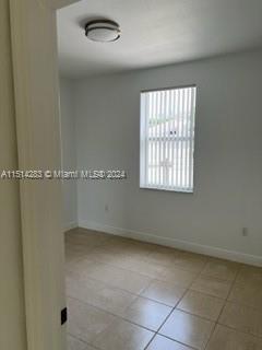 West Kendall Miami, FL 33193 - Photo 11 of 20 a view of an empty room with a window