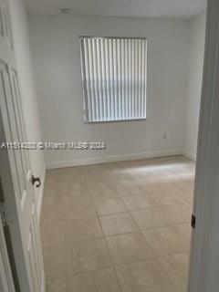 West Kendall Miami, FL 33193 - Photo 12 of 20 a view of a livingroom with an empty space and window