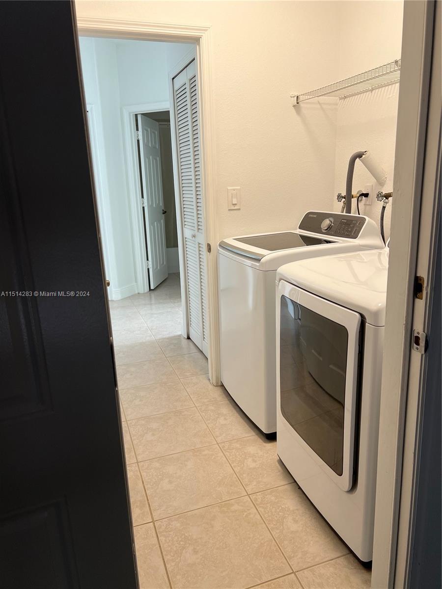 West Kendall Miami, FL 33193 - Photo 19 of 20 a utility room with dryer and washer