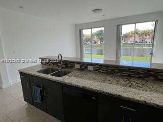 West Kendall Miami, FL 33193 - Photo 5 of 20 a kitchen with a sink and a window