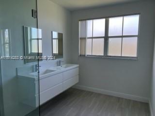 West Kendall Miami, FL 33193 - Photo 7 of 20 a bathroom with a bathtub and a sink