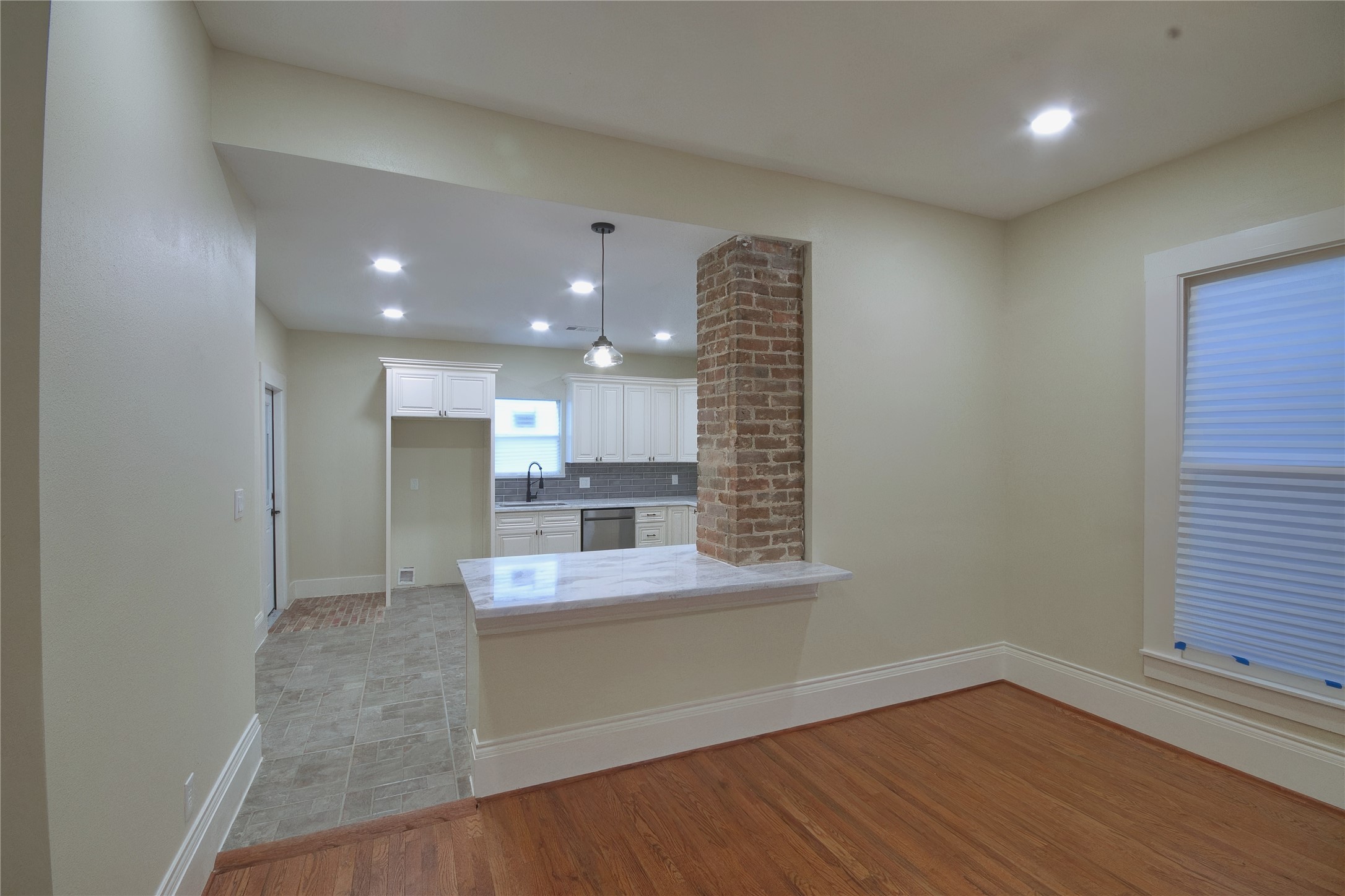 505 Winnie Street Houston, TX 77009 - Photo 11 of 29 From the Dining room. Serving bar or keep entertaining the chef by adding a couple of stools at the counter.